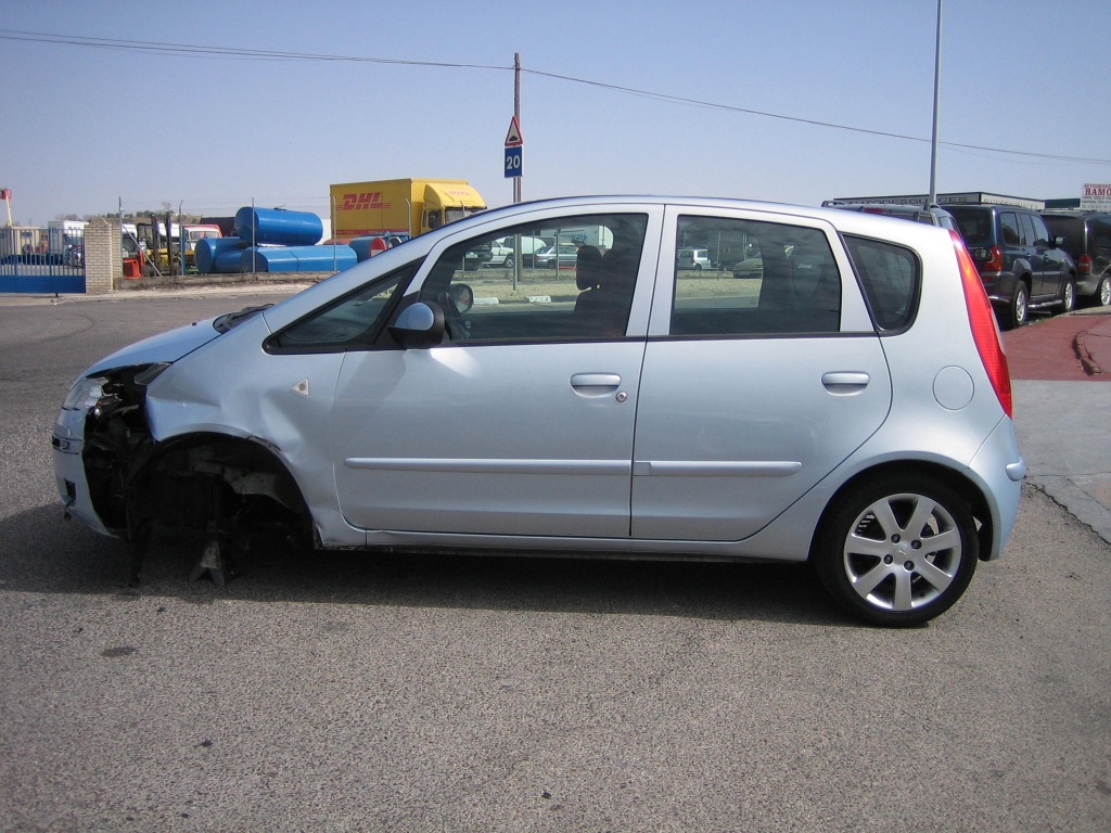 VISTA LATERAL IZQUIERDO MITSUBISHI COLT 1.5 DID 95CV