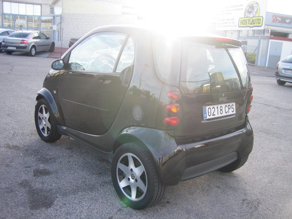 VISTA TRASERA IZQUIERDA SMART 700 GASOLINA 61CV