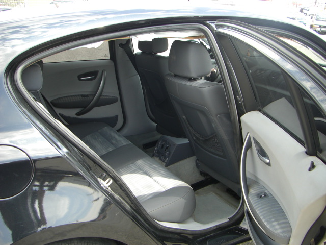 vista interior trasero BMW 118D 2.0 122CV